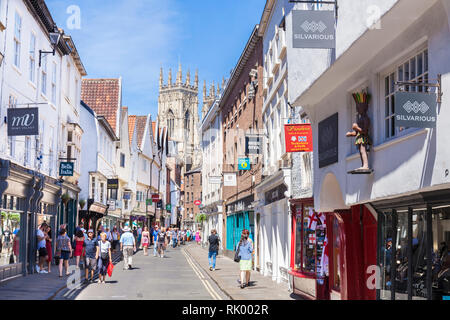 York Minster and shops on Low Petergate York Yorkshire England gb uk Europe Stock Photo