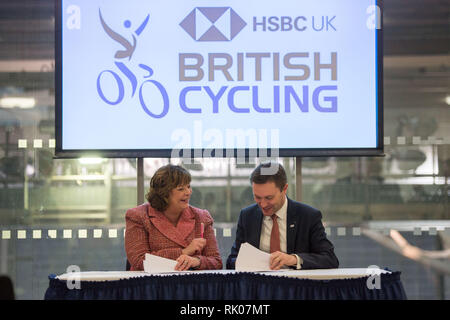 Glasgow, UK. 8 Feb 2019. (left) Fiona Hyslop MSP - Cabinet Secretary for Culture, Tourism and External Affairs, and (right) David Lappartient - President of the Union Cycliste Internationale signing an agreement.  A new multi-disciplinary cycling event will bring together 13 existing UCI cycling World Championships into one event to be held every four years, commencing in Glasgow and Scotland in 2023. Credit: Colin Fisher/Alamy Live News Stock Photo