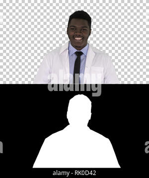 On Alpha Matte. Medium shot. Afro-American Doctor Talking To Camera, Alpha Channel Professional shot in 4K resolution. 012. You can use it e.g. in you Stock Photo