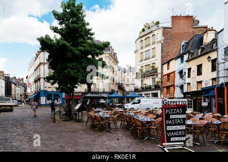 Rennes, France - July 23, 2018: Square with restaurant terraces in historic centre of the city. Rennes is the capital of the region of Brittany Stock Photo