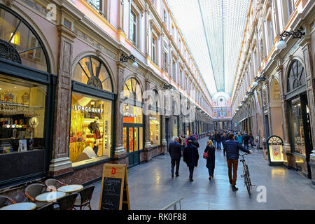 Brussels, Belgium - Shops and passers-by in the elegant shopping arcade Galeries Royales Saint-Hubert in Brussels, Brüssel, Belgien - Geschaefte und P Stock Photo