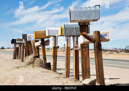 Row Of Mailboxes Along Desert Road Stock Photo