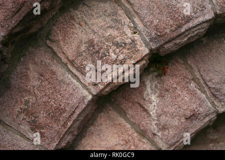 Grey stone wall. Wall made of natural stone Stock Photo