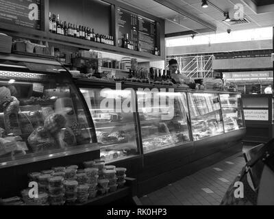 New York City Delicatessen in black and white, showing huge variety of available food products. Small business in a huge city. Stock Photo