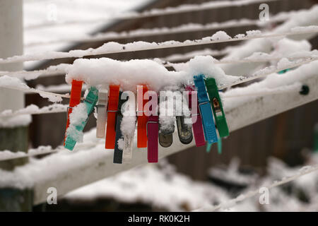 Linen clothespins / Linen clothespins on a winter day Stock Photo