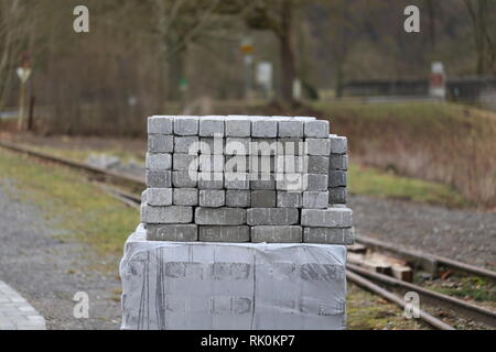 Stack of bricks / Bricks neatly stacked against the wall Stock Photo