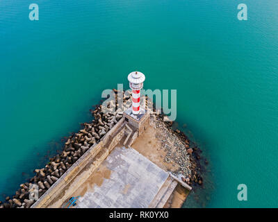 Drone top view over the lighthouse of the port Burgas sea shore in Burgas town,Bulgaria
