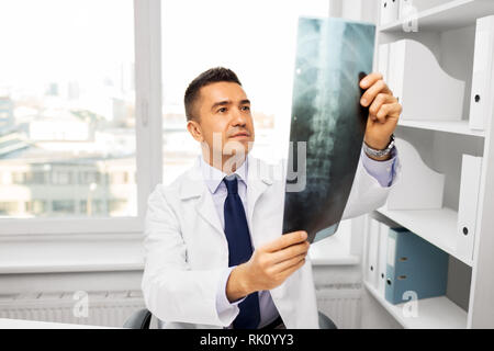 doctor with x-ray scan at hospital Stock Photo