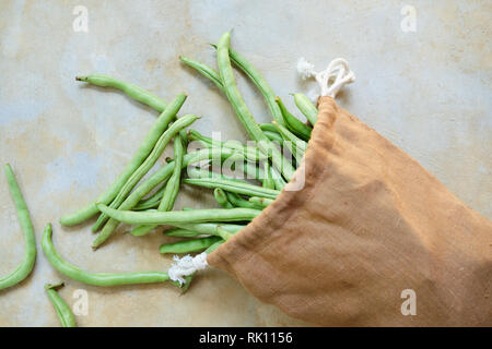 Fresh Green Asparagus Bunch in Eco Textile Bag Stock Photo