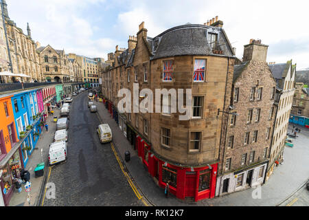 Elevated wide angle view of historic Victoria Street in Edinburgh Old Town, Scotland, UK