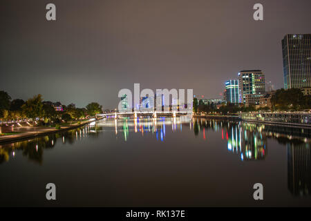 Frankfurt's Skyline reflectes on the calm waters of the Main River Stock Photo
