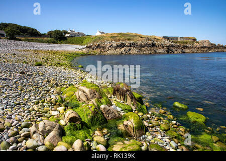 View toward Fort Doyle along Crabby Beach on Alderney Channel Islands. Stock Photo