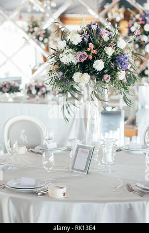 Table set for wedding or another catered event dinner. Stock Photo