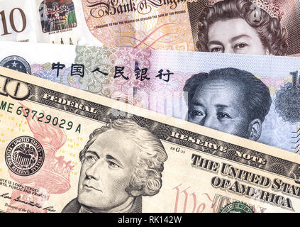 Different reserve currency of dollar, yuan, pound close up Stock Photo