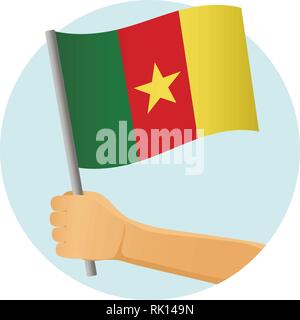 Cameroon flag in hand. Patriotic background. National flag of Cameroon vector illustration Stock Vector