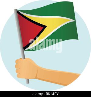 Guyana flag in hand. Patriotic background. National flag of Guyana vector illustration Stock Vector