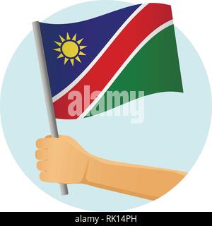 Namibia flag in hand. Patriotic background. National flag of Namibia vector illustration Stock Vector