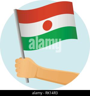 Niger flag in hand. Patriotic background. National flag of Niger vector illustration Stock Vector