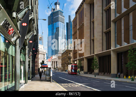 LONDON, UK - SEPTEMBER 9, 2018: Walking through the city center, buildings under construction, double decker on the road Stock Photo