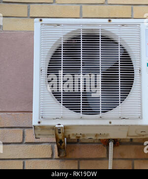 Old machine air condition on wall Stock Photo