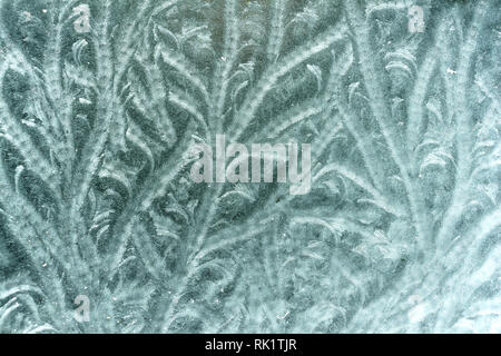 Natural pattern formed by frost on an outside glass table top Stock Photo
