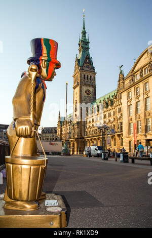 Hamburg, Germany; View of the Rathaus (Town Hall) with statues of the city mascot, Hans Hummel. Stock Photo