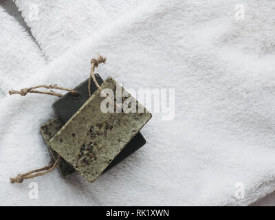 Natural handmade soap on a on white towel Stock Photo