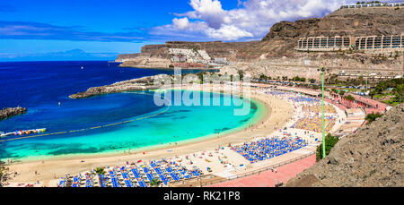 Turquoise sea in Playa de los Amadores,Gran Canaria,Spain. Stock Photo