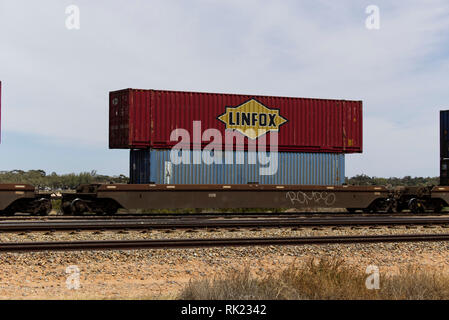 Double stacked shipping containers on a freight train at Port Augusta South Australia Stock Photo