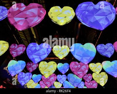 Heart-shaped lantern hanging over a lane in Yuyuan Garden during Chinese New Year. 02/07/2019. Shanghai, China. Stock Photo