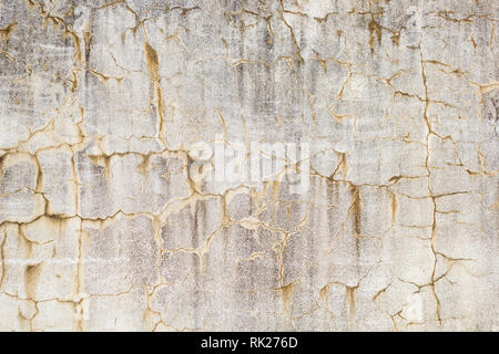 old grunge wall with cracks and stains texture close up Stock Photo