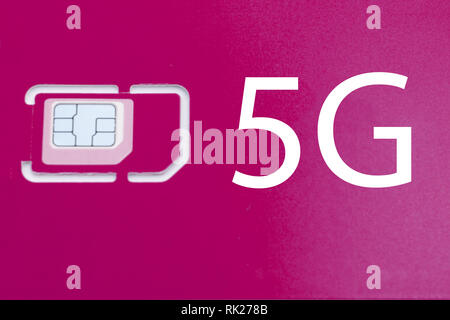 mobile phone sim card on a white background 5G . Stock Photo