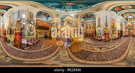 360 degree panoramic view of GRODNO, BELARUS - MARCH, 2017: Full seamless panorama 360 angle degrees view inside interior of small orthodox church with icons near altar in equirec