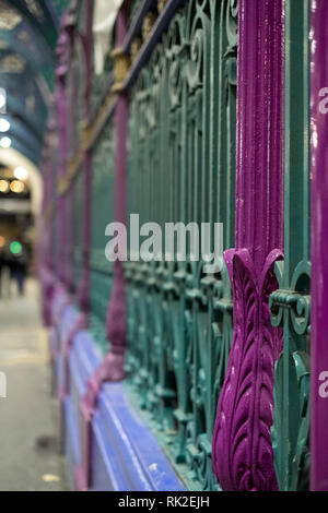Detailed view of the colourful wrought ironwork at Smithfield meat and poultry market in the City of London, UK. Stock Photo