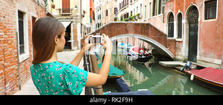 Woman taking picture in Venice banner panoramic view Stock Photo