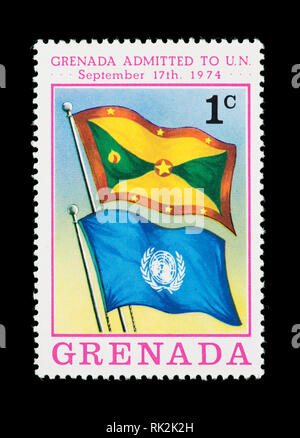 Postage stamp from Grenada depicting the Granada and United Nations flags, admission to the UN in 1974. Stock Photo