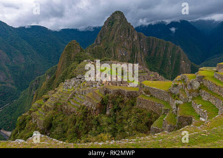 A dramatic sky above the Inca ruins of Machu Picchu, Cusco province, Peru. Stock Photo