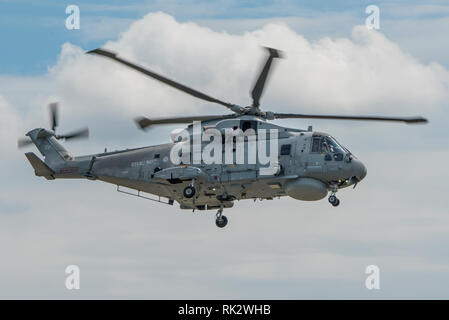 A Royal Navy Merlin HM2 anti-submarine helicopter displays at the RNAS Yeovilton International Air Day, UK on the 8th July 2017. Stock Photo