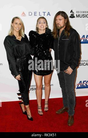 LOS ANGELES, CA - FEBRUARY 08: Tish Cyrus, Miley Cyrus, Billy Ray Cyrus at the MusiCares Person of the Year Tribute held at Los Angeles Convention Center, West Hall on February 8, 2019 in Los Angeles, California. Photo: imageSPACE/MediaPunch Stock Photo