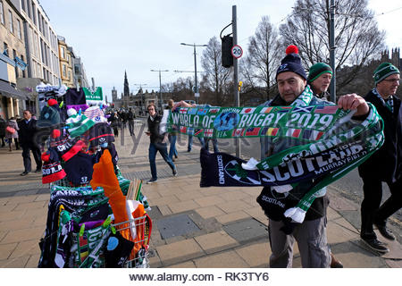 Edinburgh, United Kingdom. 9th February 2019. Vendor on Princes Street selling scarves and hats before the Six Nations Rugby game, Scotland v Ireland at Murrayfield stadium. Credit: Craig Brown/Alamy Live News Stock Photo