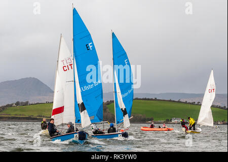 Bantry, West Cork, Ireland. 9th Feb, 2019. Bantry Sailing Club is hosting the Irish Universities Sailing Regatta, organised by UCC, this weekend when approx. 150 sailors from 8 universities around Ireland gather for racing and social events. The regatta consists of 80 races over the two days in 'Firefly' sailing dinghies. Credit: Andy Gibson/Alamy Live News. Stock Photo