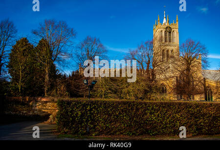 Melton Mowbray, Leicestershire, UK.  9th Feburary 2019; Blue skies and golden sunshine late afternoon with chilly wind St Marys church bask in sunlight. Home to the pork pie. Clifford Norton Alamy Live News. Credit: Clifford Norton/Alamy Live News Stock Photo