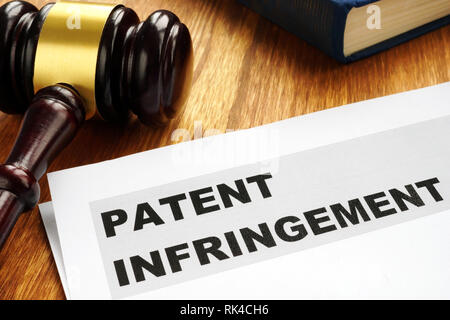 Patent infringement and gavel. Copyright law concept. Stock Photo