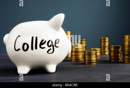College fund. Piggy bank with coins. Money for education. Stock Photo
