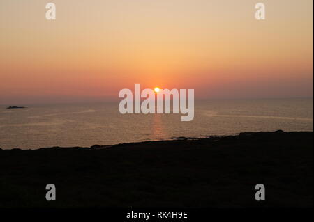 Sunset on Spiaggia la Pelosa, in Stintino, north-west Sardinia, Italy. Stock Photo