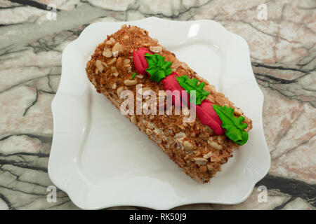 Slices of sweet cream roll temptation vanilla wooden . Stock Photo