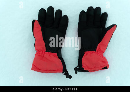 Gym equipment fitness routine and healthy lifestyle concept with workout gloves used to protect the hands from developing corns and calluses isolated  Stock Photo