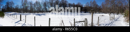 Panoramic shot of the campaign snowy in Auvergne. On the way to the Puy de Parioux, col ghouls, Puy-de-Dome, Auvergne Stock Photo