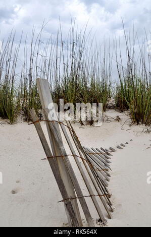 Gulf Shores Sand Dunes and Fence Stock Photo