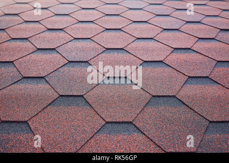 Soft roof, roof tiles. Flexible shingles.  Roof tiling texture. Flexible, soft, bituminous, composite Stock Photo